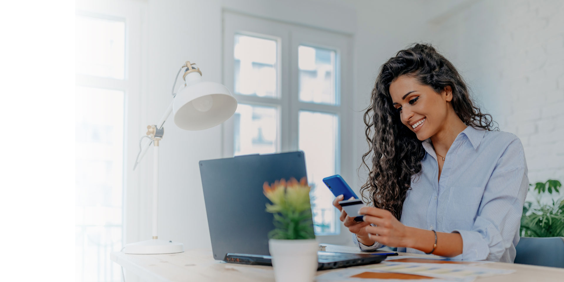 A woman activating her debit card