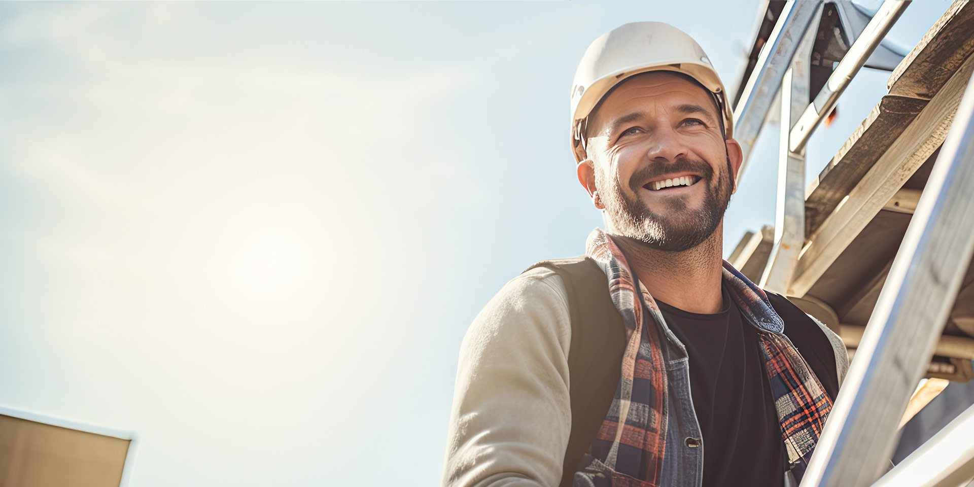 Man in hardhat working on a jobsite