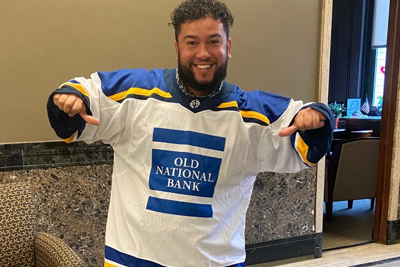 A team member wearing an Old National shirt