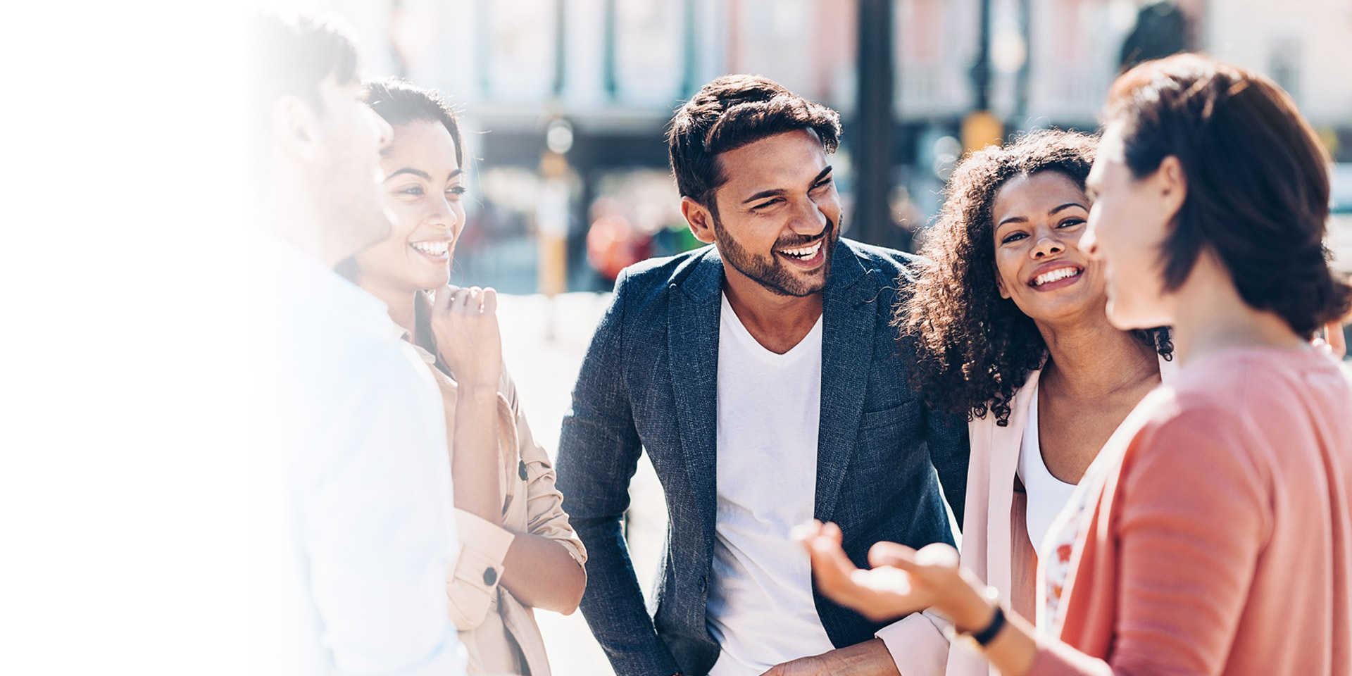 A group of people gathered together talking