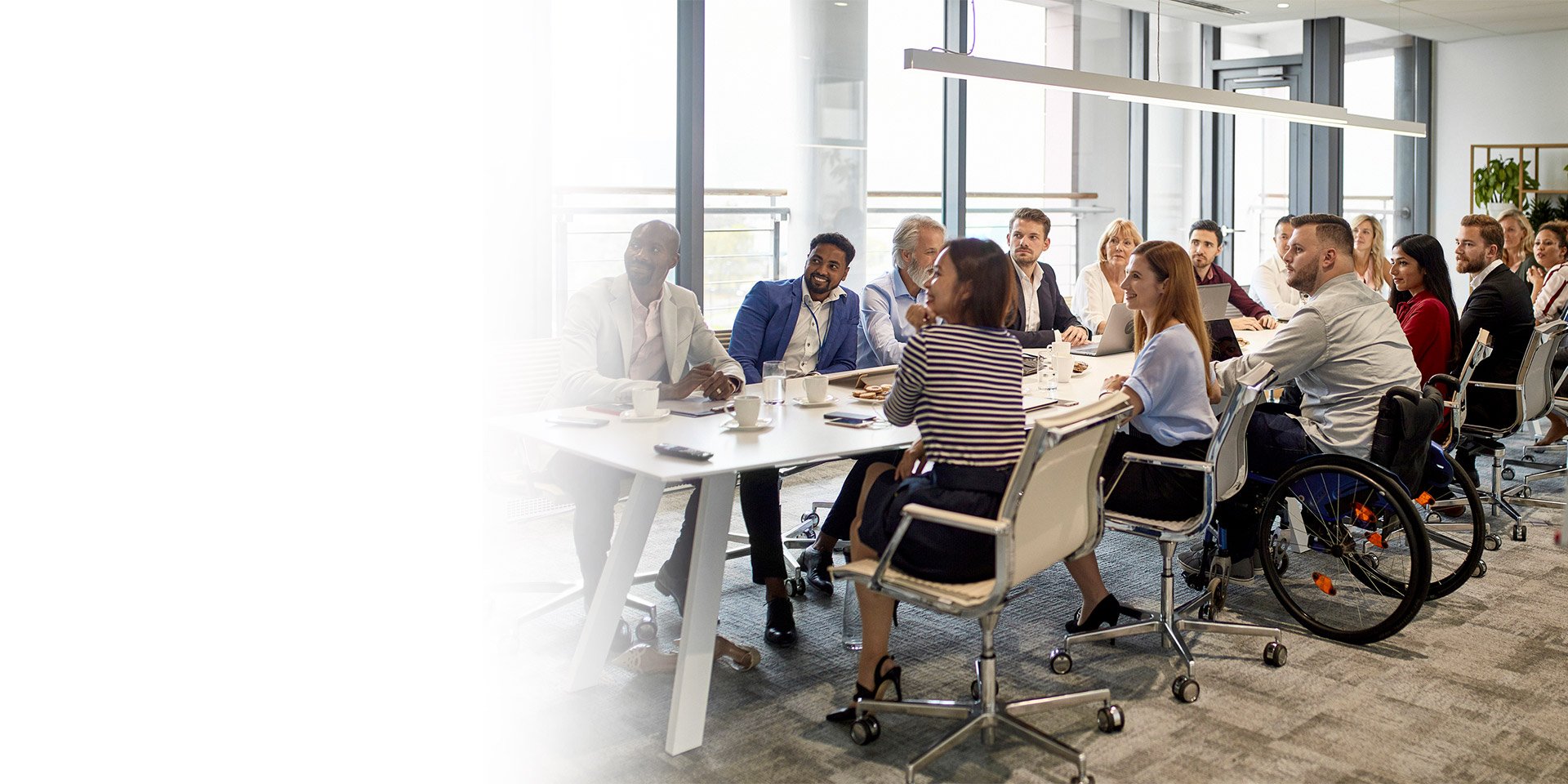 A group of people together having a meeting