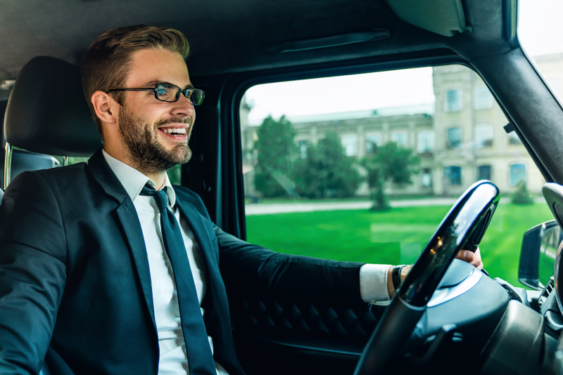 A man driving his car