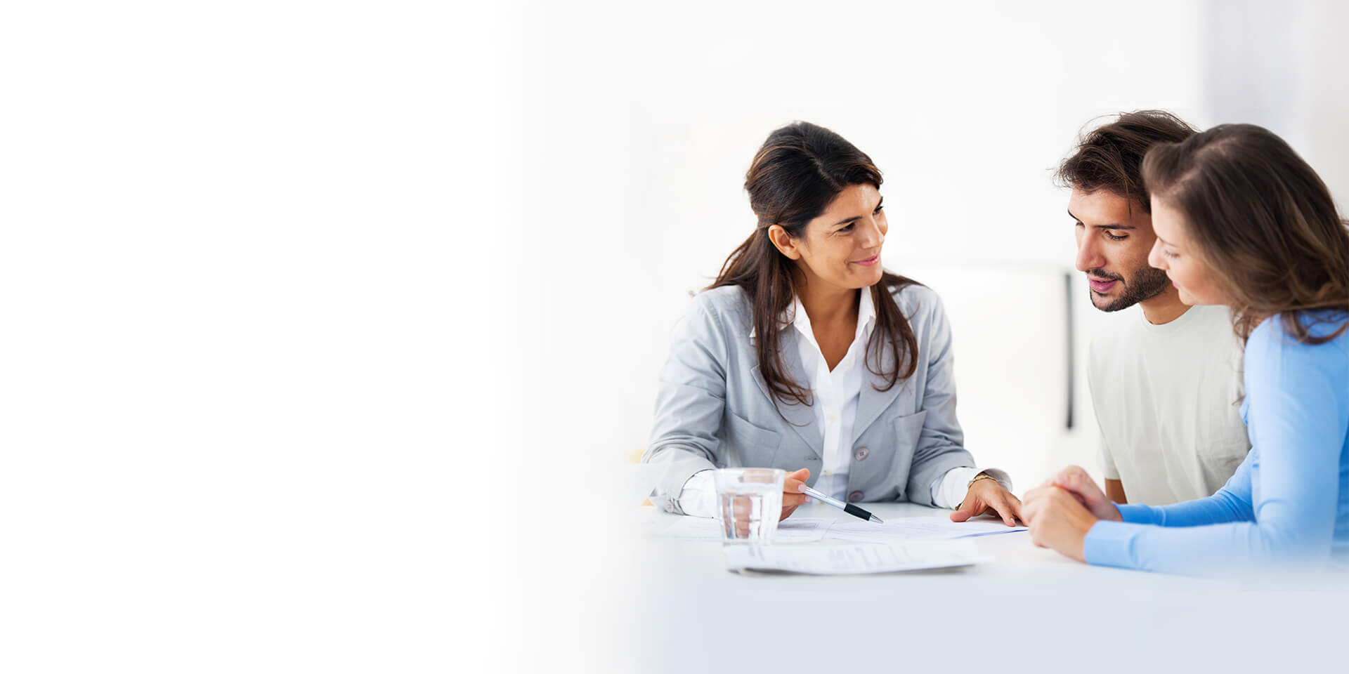 Clients meeting with a lender regarding a loan