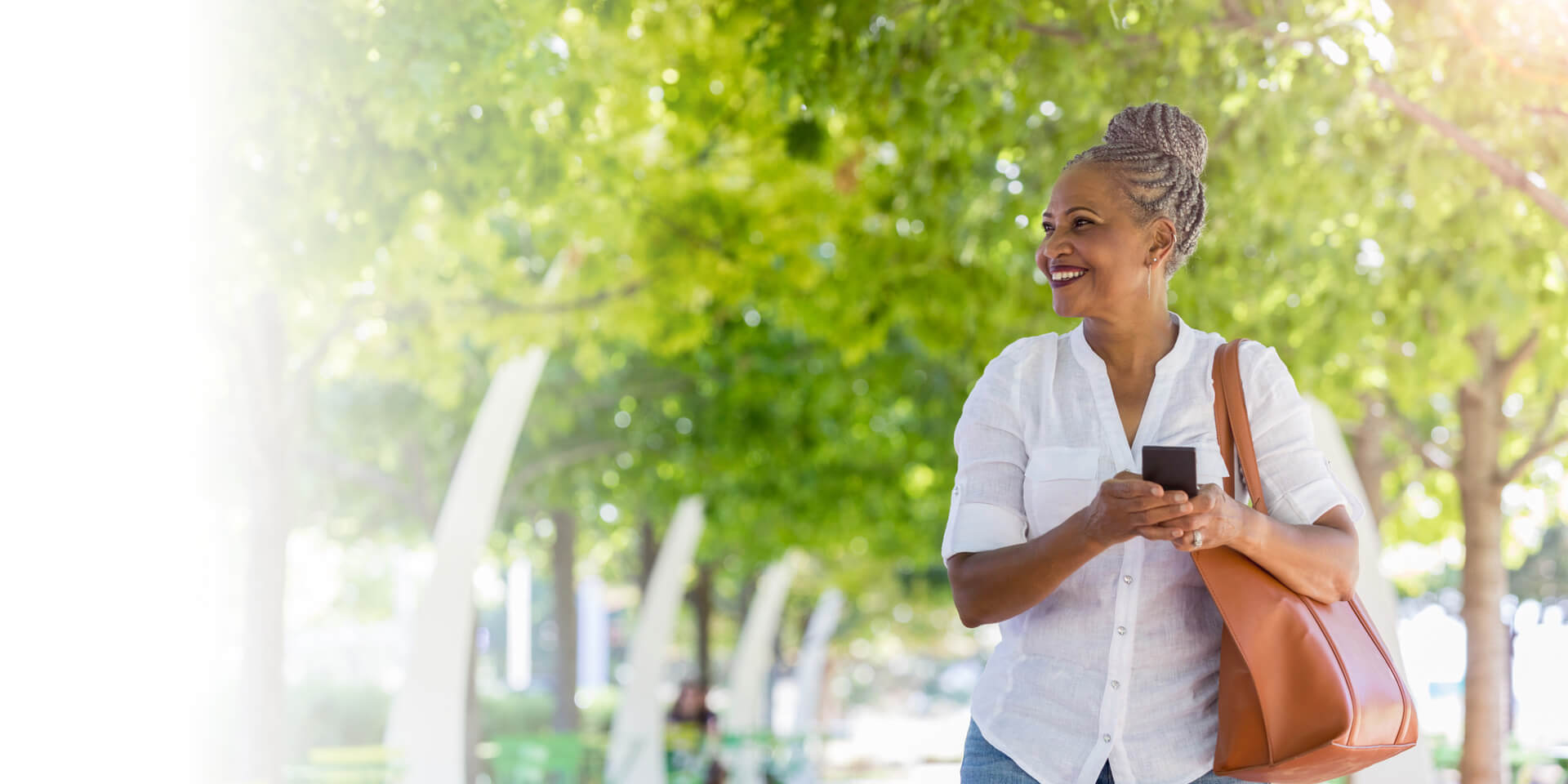 A woman out for a walk in the park