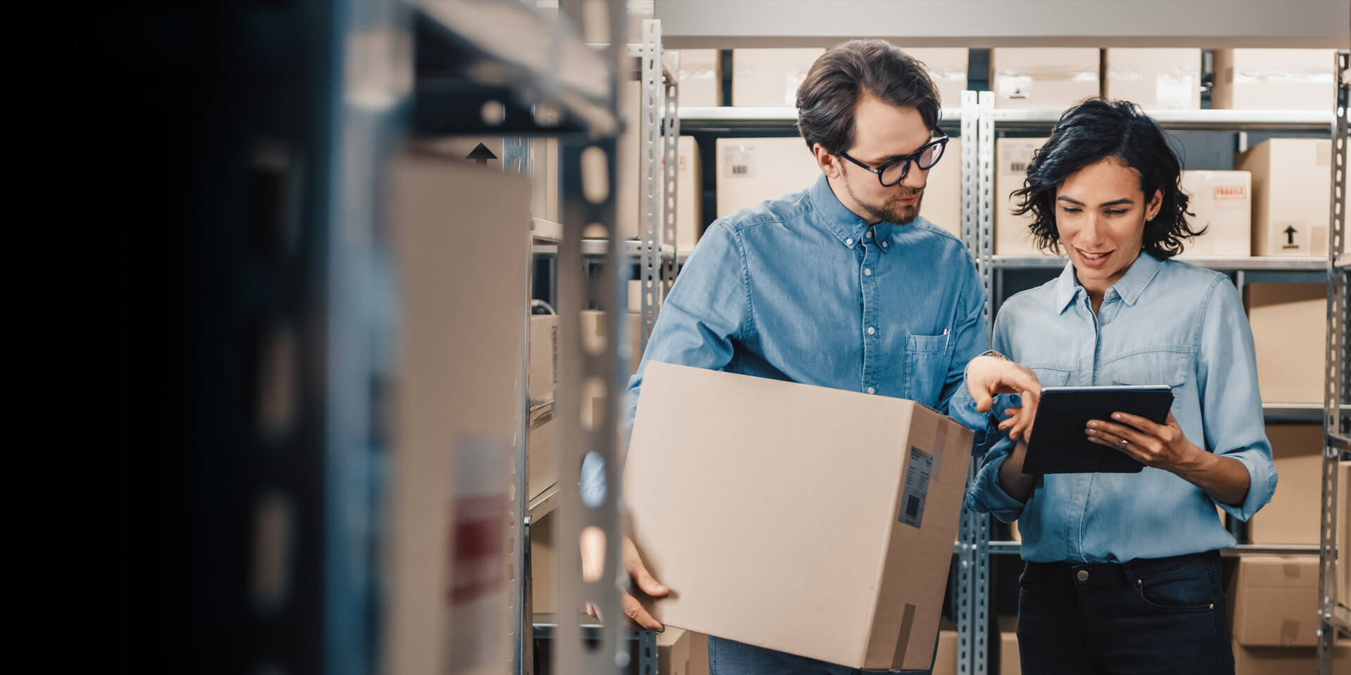 Two coworkers preparing for an order