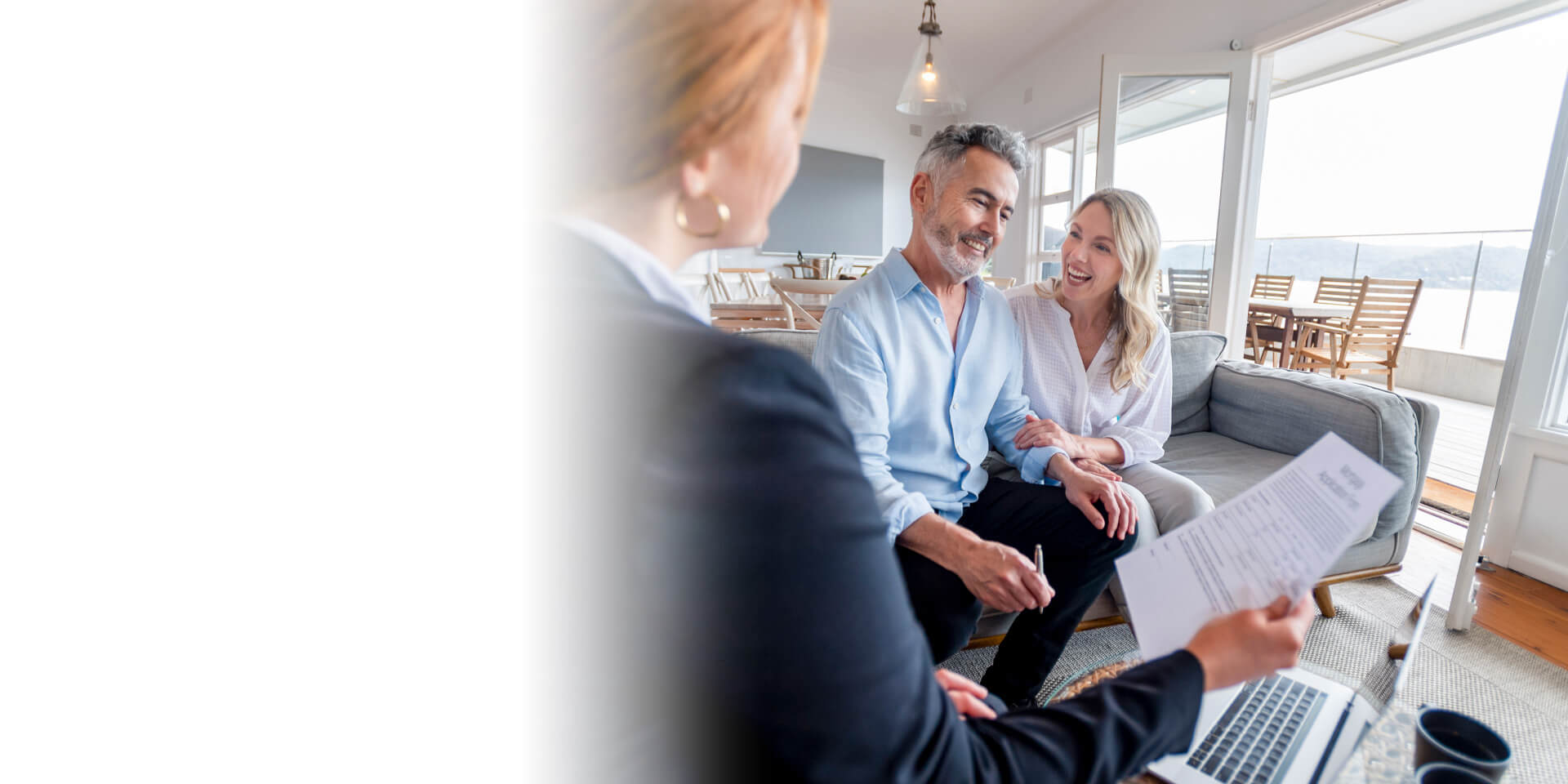 A family looking at their new mortgage agreement