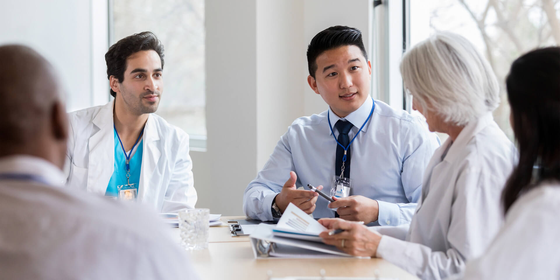 A meeting in a room filled with medical staff