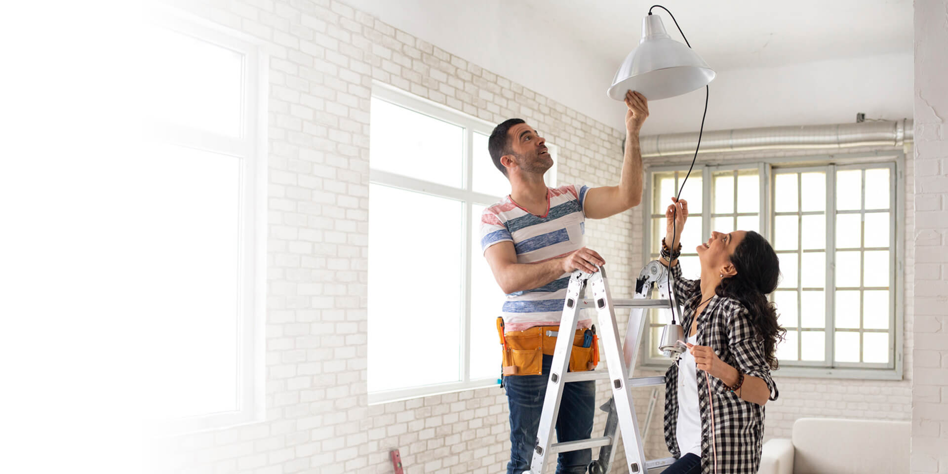 A couple working on home improvements