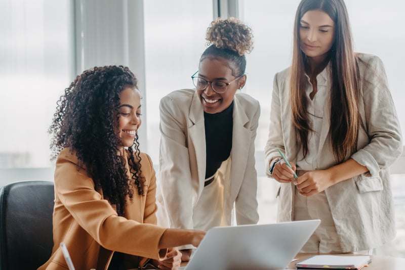 Team members collaborating for a meeting