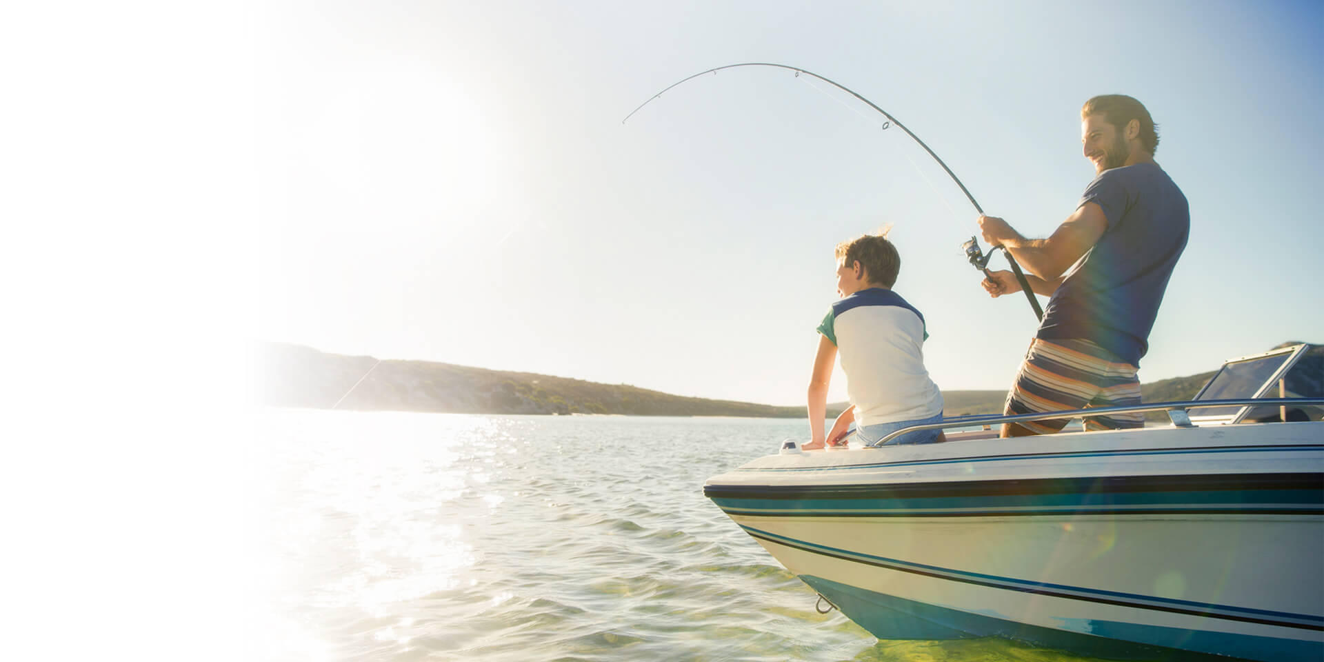 A father and son out on their fishing boat