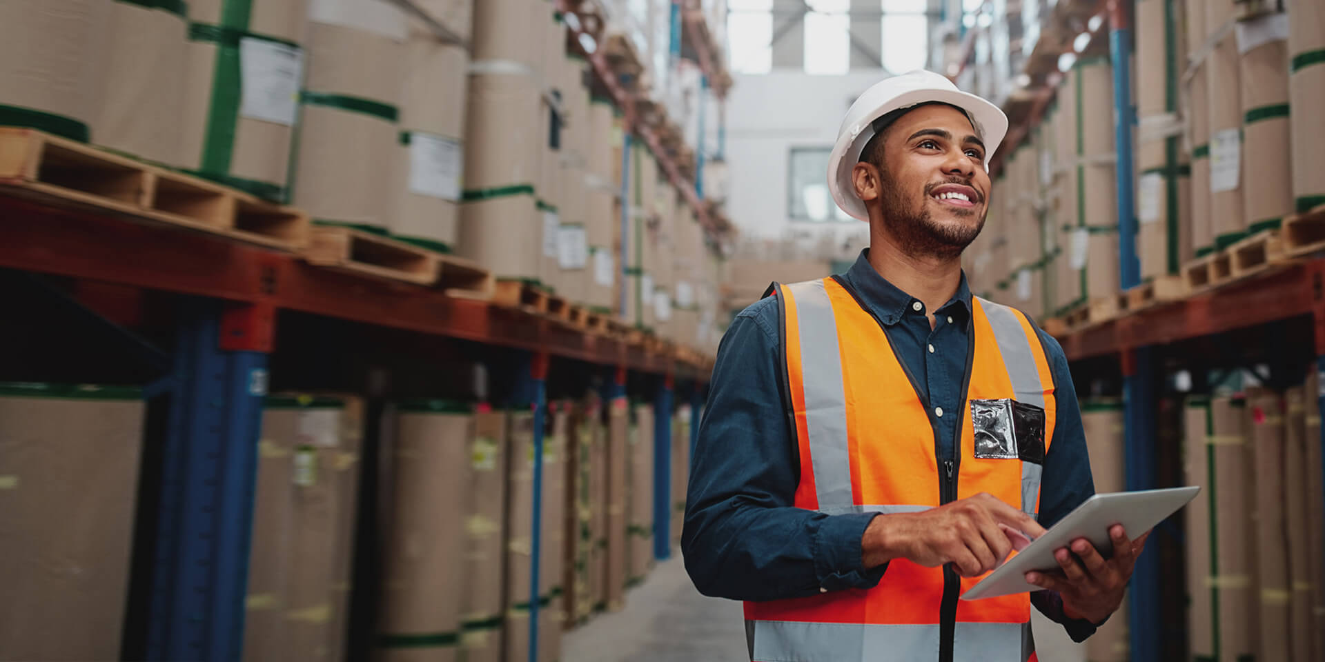 A worker taking inventory at the warehouse