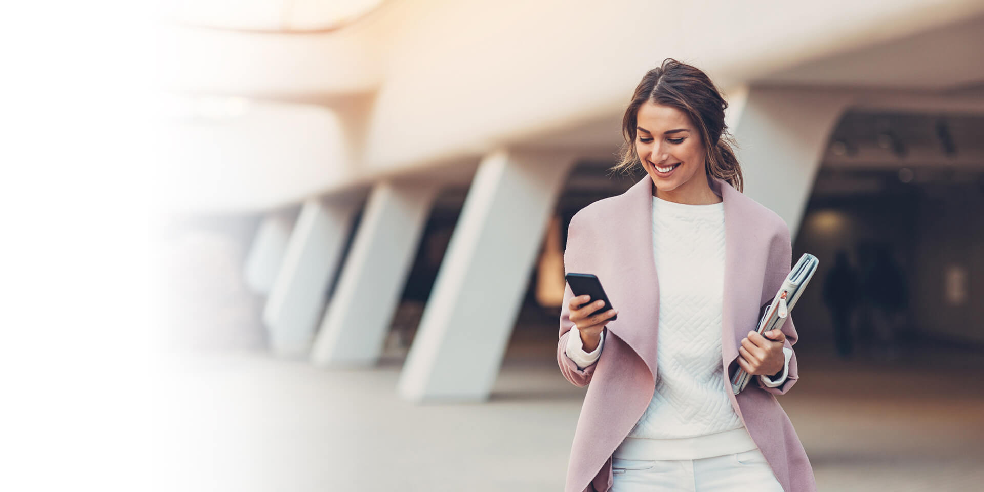 A woman checking her Old National Bank Private Prestige Checking account information