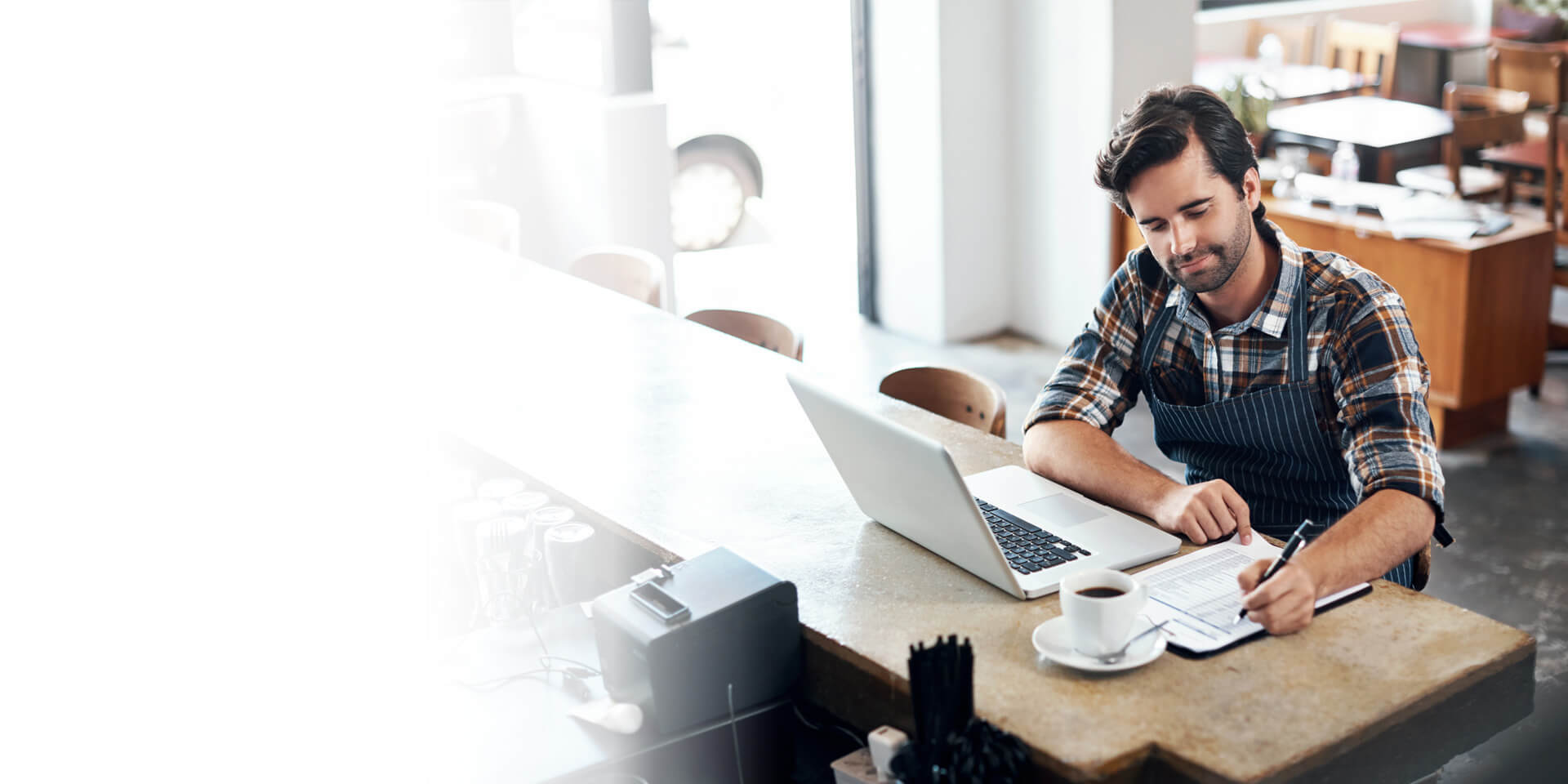 A business owner paying his bills through Online Banking